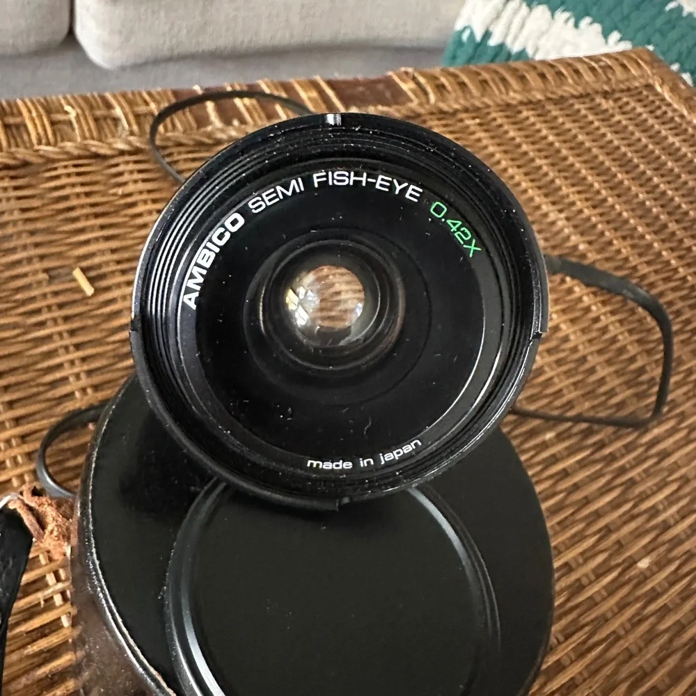 Ambico semi fish-eye 0.42x lens with vintage leather canon case
